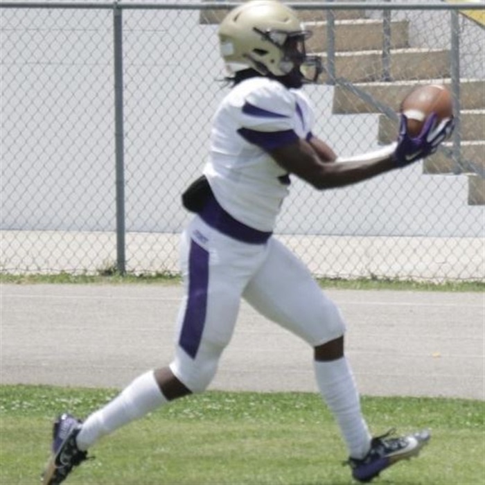 Tyrone Hayes catches the ball.