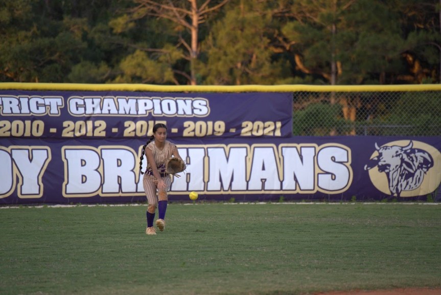 Tehya Nunez fielding a ball in center field.